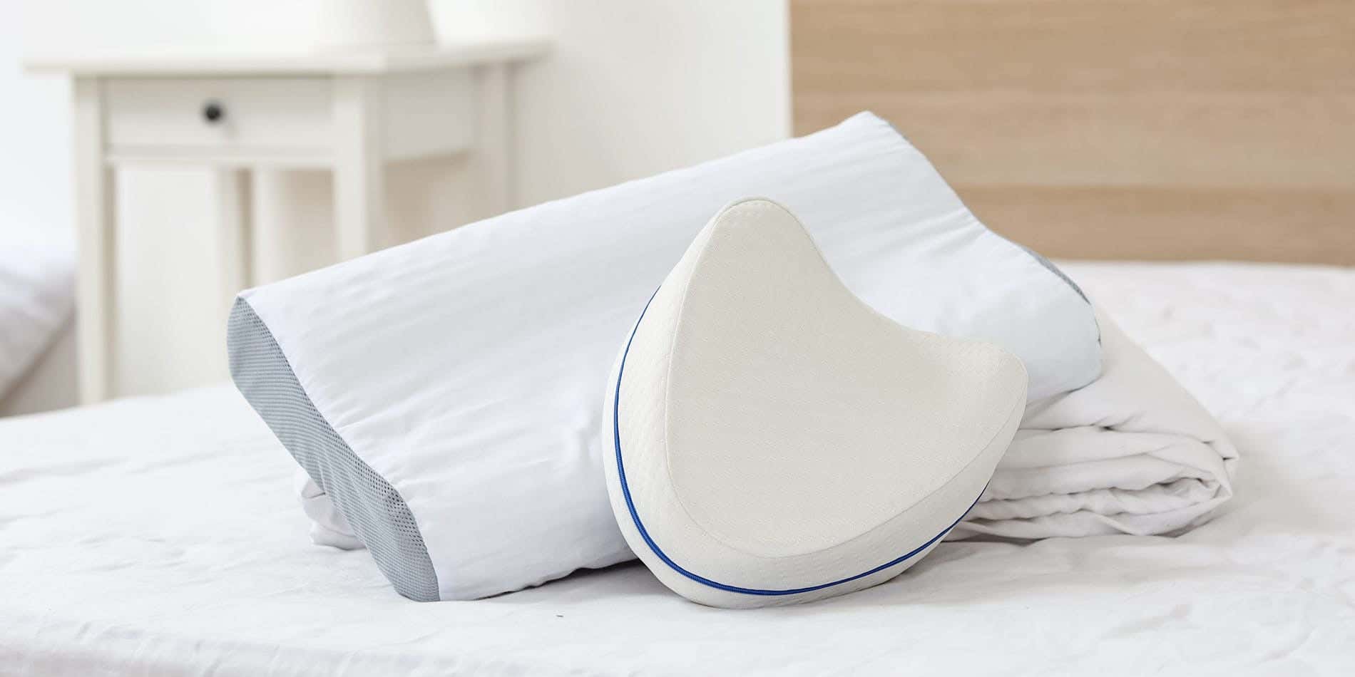 Two pillows on bed
